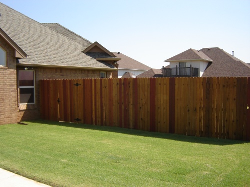 Below is an 8' foot high, all cedar, privacy fence, custom built on site in 